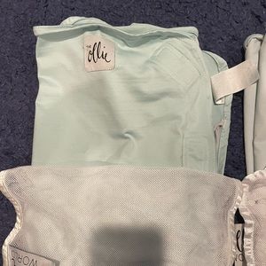 Good used condition Ollie Swaddle with mesh bag. Light blue.